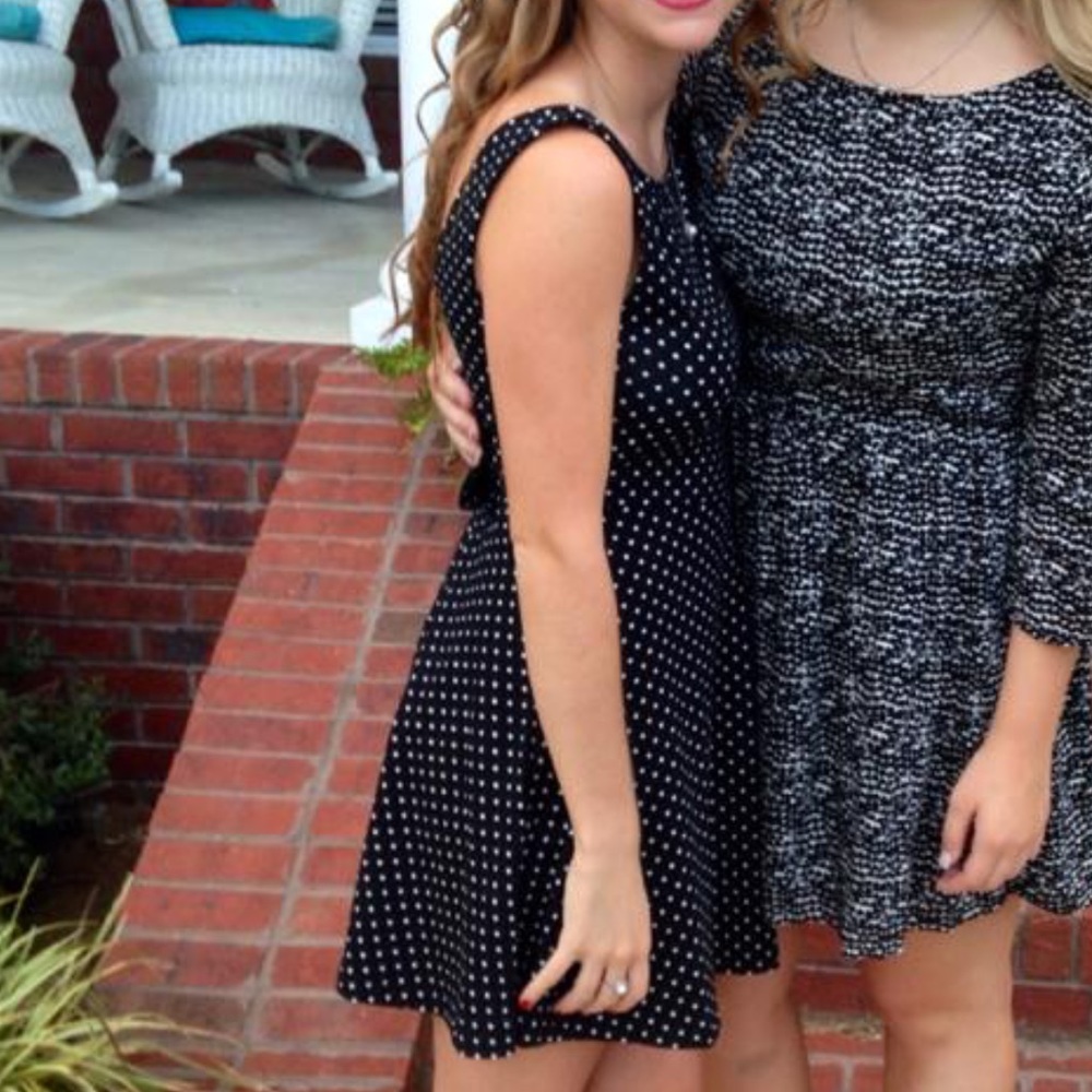 Black polka dot dress with detail bow on back